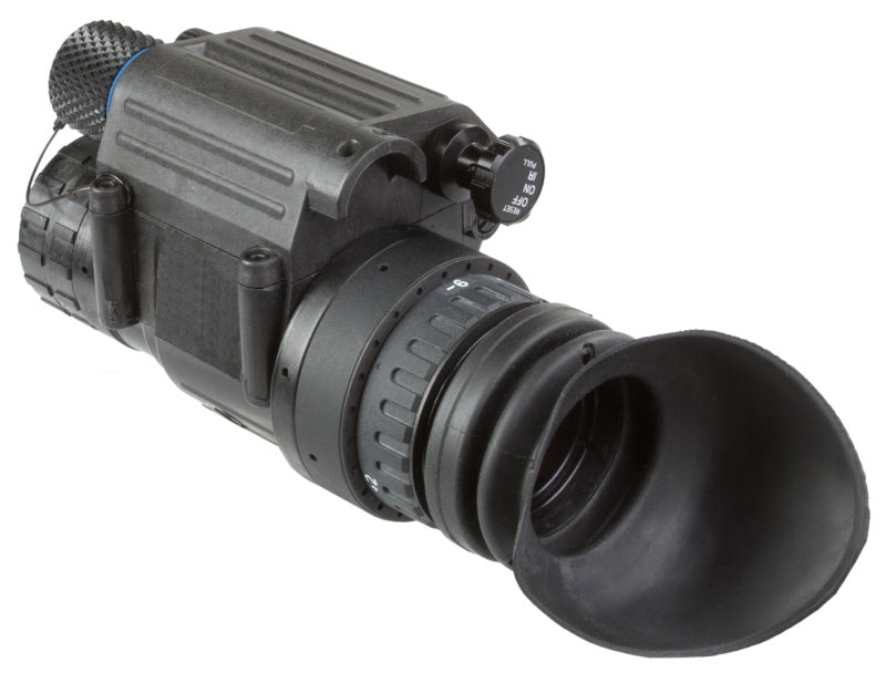 AGM PVS-14 Night Vision Monocular mounted on a combat helmet, highlighting its compatibility with helmet-mounted systems for enhanced versatility