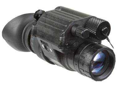 AGM PVS-14 Monocular highlighted in a combat setting, emphasizing its military-grade ruggedness and adaptability to extreme environments