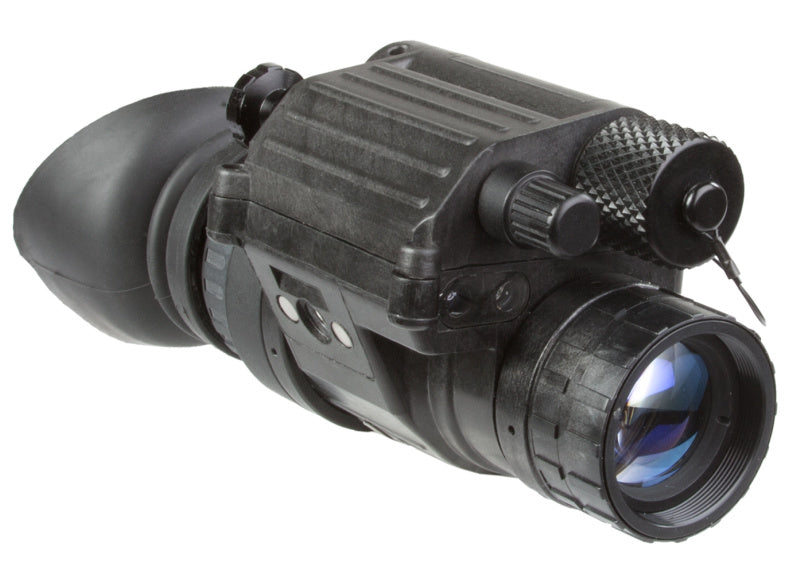 AGM PVS-14 Night Vision Monocular in use during nighttime combat operations, demonstrating its reliability in extreme environments.