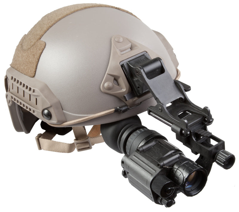 AGM PVS-14 Monocular attached to a combat helmet, illustrating its compatibility with helmet mounts for versatile usage