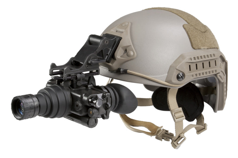 AGM PVS-7 goggles mounted on a combat helmet, demonstrating compatibility with flip-up shut-off functionality for tactical scenarios