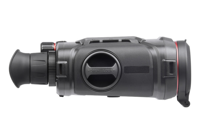 Close-up of the AGM Voyage TB50-384 binocular's built-in 1000m laser rangefinder for precise distance measurement in the field