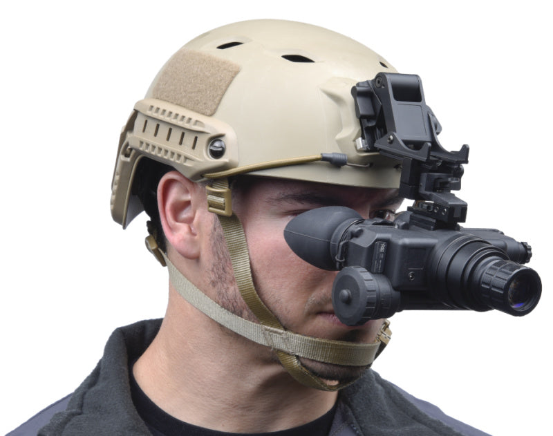 AGM Wolf-7 PRO Night Vision Goggles mounted on a helmet, showcasing hands-free functionality for enhanced usability during operations